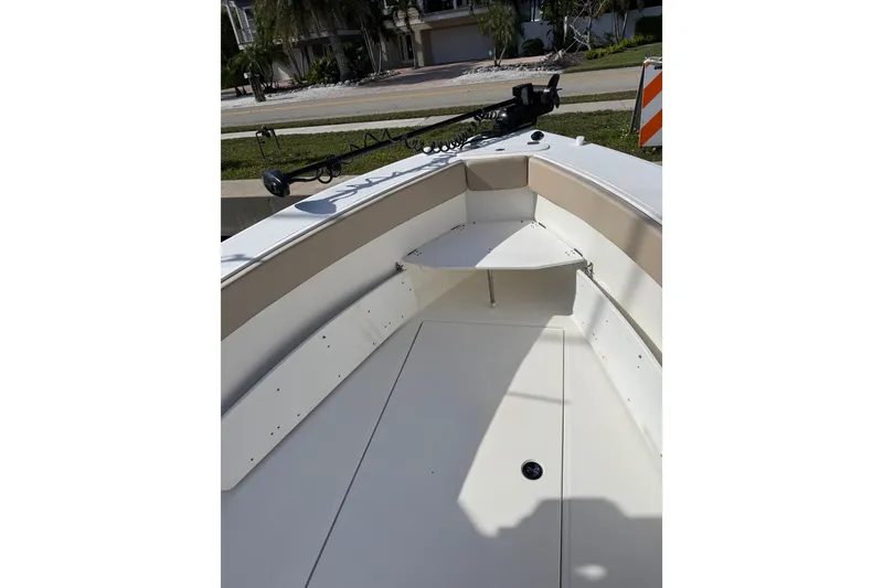 Slide: The Image of 2017 Stamas 308 Predator boat interior with seating and fishing rod holder. - 26