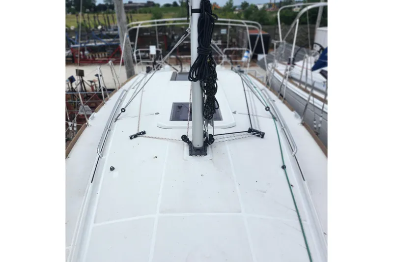 Slide: The Image of 2023 Jeanneau Sun Odyssey 349 sailboat deck with rigging and equipment. - 10