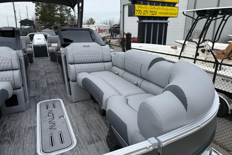 Slide: The Image of 2026 Avalon Catalina Quad Lounger Windshield with luxurious gray seating and modern design. - 11
