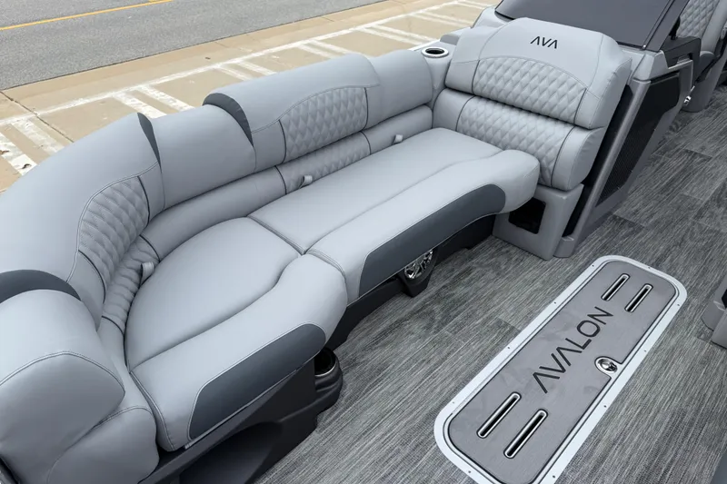 Slide: The Image of 2026 Avalon Catalina Quad Lounger Windshield with luxurious gray seating and stylish design. - 12