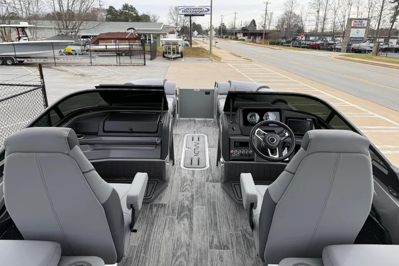 Slide: The Image of 2026 Avalon Catalina Quad Lounger Windshield interior with modern dashboard and seating. - 15