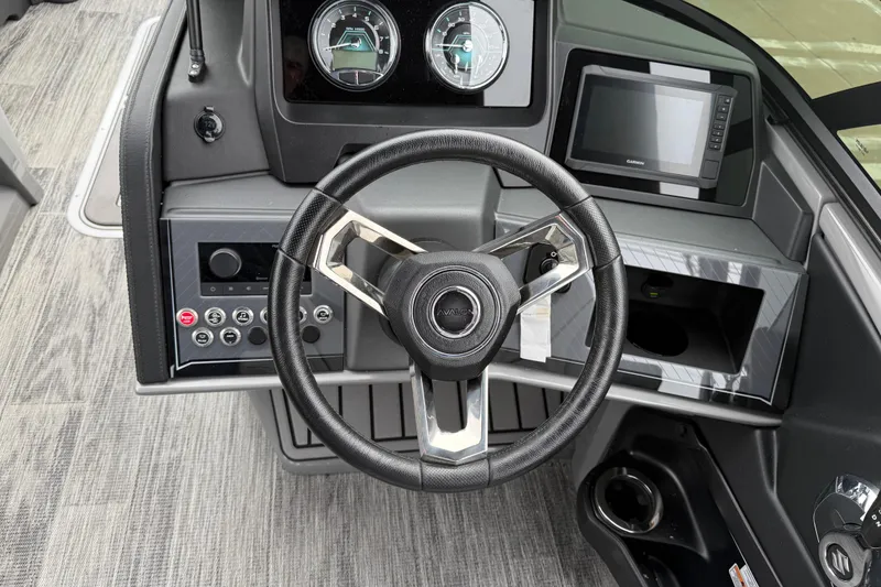 Slide: The Image of 2026 Avalon Catalina Quad Lounger Windshield dashboard with steering wheel and modern controls. - 18