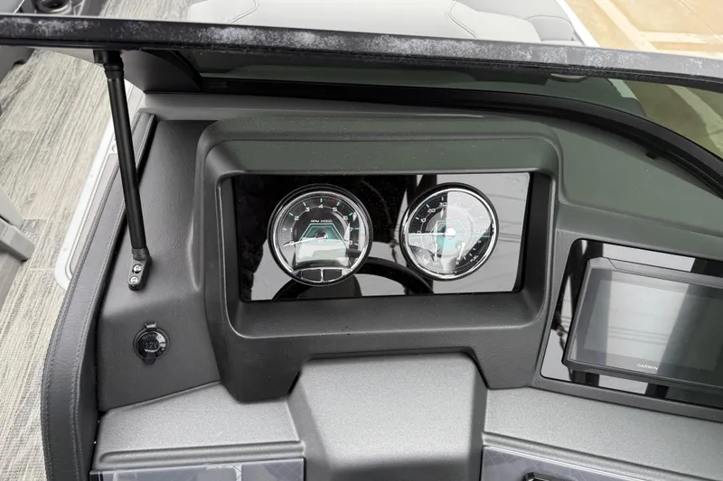 Slide: The Image of 2026 Avalon Catalina Quad Lounger Windshield dashboard with gauges and display. - 19