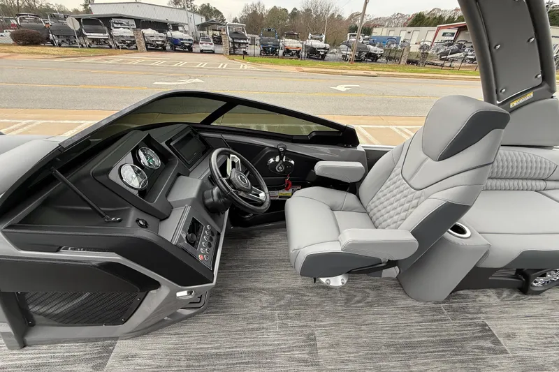 Slide: The Image of 2026 Avalon Catalina Quad Lounger Windshield interior with modern dashboard and luxurious seating. - 21