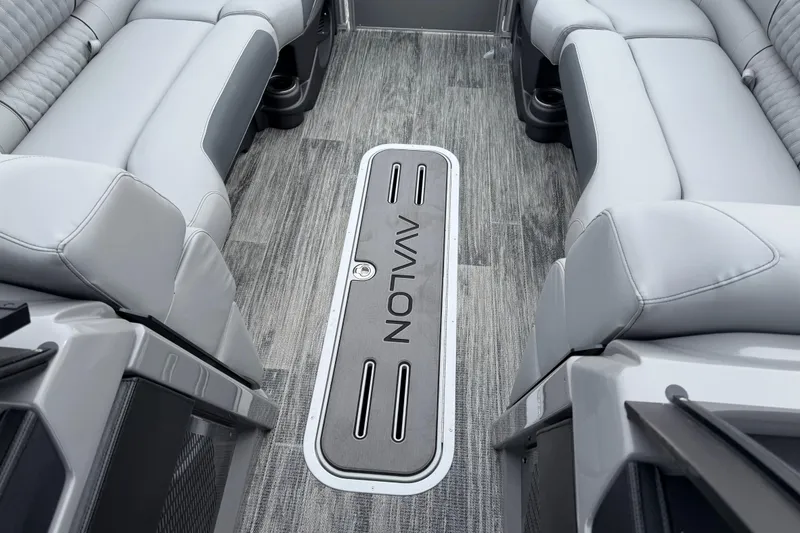 Slide: The Image of 2026 Avalon Catalina Quad Lounger Windshield interior with gray seating and flooring. - 27