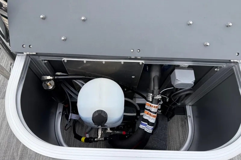 Slide: The Image of Engine compartment of 2026 Avalon Catalina Quad Lounger Windshield boat, showcasing internal components. - 34
