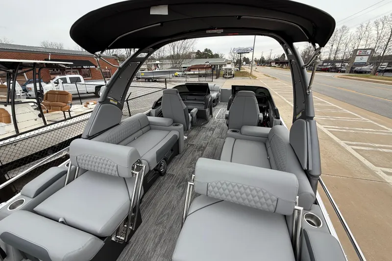 Slide: The Image of 2026 Avalon Catalina Quad Lounger Windshield boat with luxurious seating and modern design. - 35