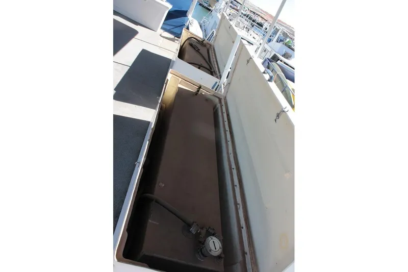 Slide: The Image of Open storage compartment on 1996 Stardust Cruisers 1655 houseboat deck. - 40