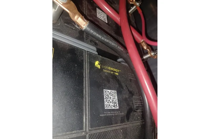 Slide: The Image of Battery setup in a 1996 Stardust Cruisers 1655, featuring Lion Energy Safari UT-1300. - 44