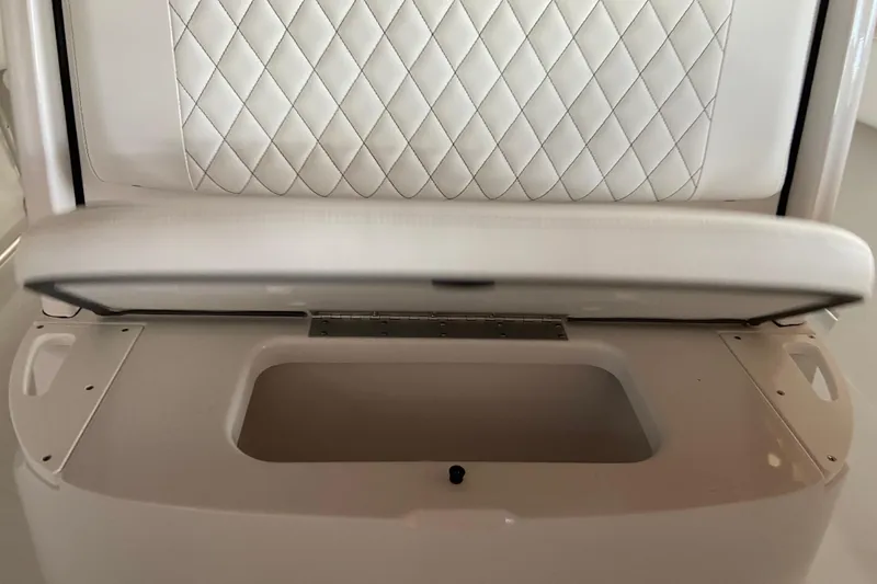 Slide: The Image of 2026 Sportsman Open 232 Center Console seat with diamond-stitched upholstery and storage compartment. - 29