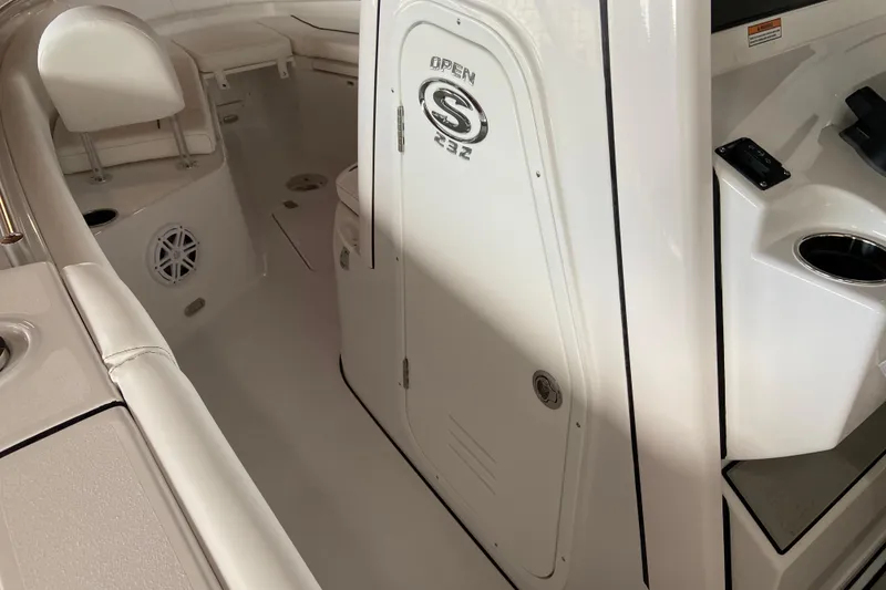 Slide: The Image of 2026 Sportsman Open 232 Center Console interior with seating and storage compartments. - 30