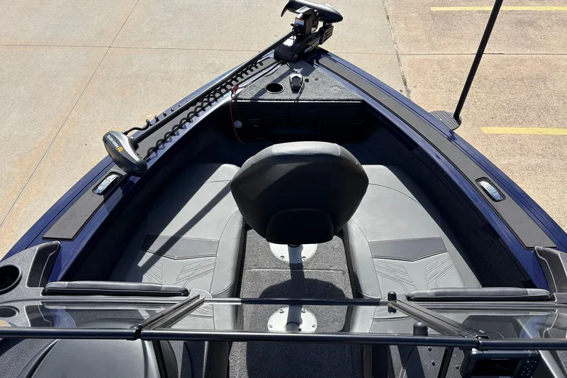 Slide: The Image of 2024 Tracker Targa V-18 Combo boat interior with seating and control panel. - 11