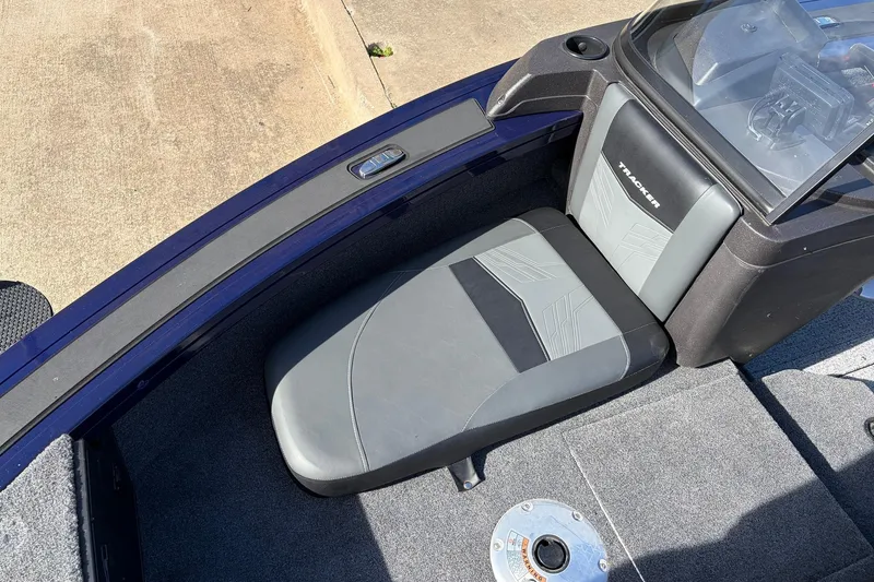 Slide: The Image of 2024 Tracker Targa V-18 Combo boat seat and console, featuring sleek design and durable materials. - 16