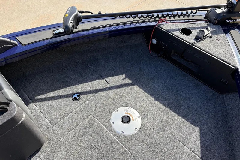 Slide: The Image of 2024 Tracker Targa V-18 Combo boat interior with Minn Kota trolling motor. - 18