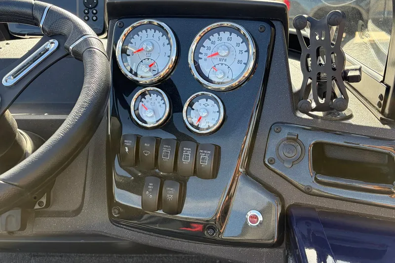 Slide: The Image of Dashboard of 2024 Tracker Targa V-18 Combo boat with gauges and controls. - 42