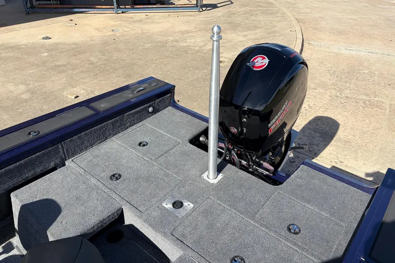 Slide: The Image of 2024 Tracker Targa V-18 Combo boat with Mercury engine, rear deck view. - 60