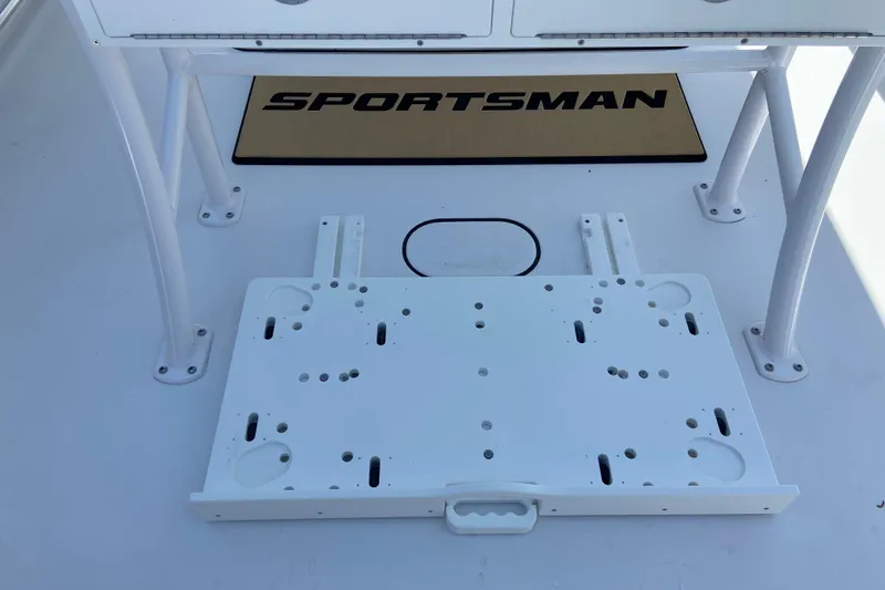 Slide: The Image of 2026 Sportsman Heritage 231 Center Console boat deck with mounting bracket and logo mat. - 10