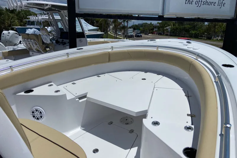 Slide: The Image of 2026 Sportsman Heritage 231 Center Console boat with spacious seating and modern design. - 22