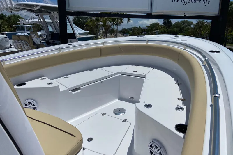 Slide: The Image of 2026 Sportsman Heritage 231 Center Console boat with spacious seating and sleek design. - 23