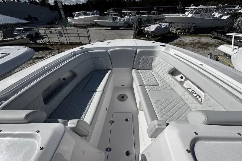 Slide: The Image of 2026 Southport 33 DC boat interior with luxurious seating and modern design. - 2