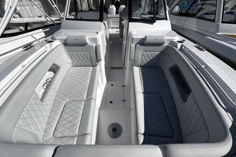 Slide: The Image of 2026 Southport 33 DC boat interior with luxurious seating and modern design. - 5