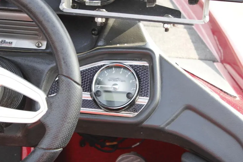 Slide: The Image of 2016 Skeeter FX20 dashboard with steering wheel and speedometer. - 12