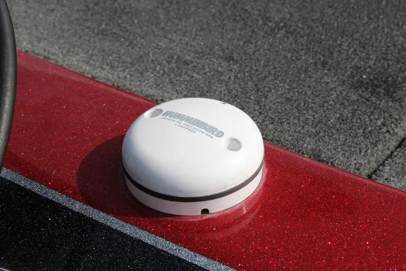 Slide: The Image of 2016 Skeeter FX20 boat with Humminbird GPS antenna on red deck. - 17