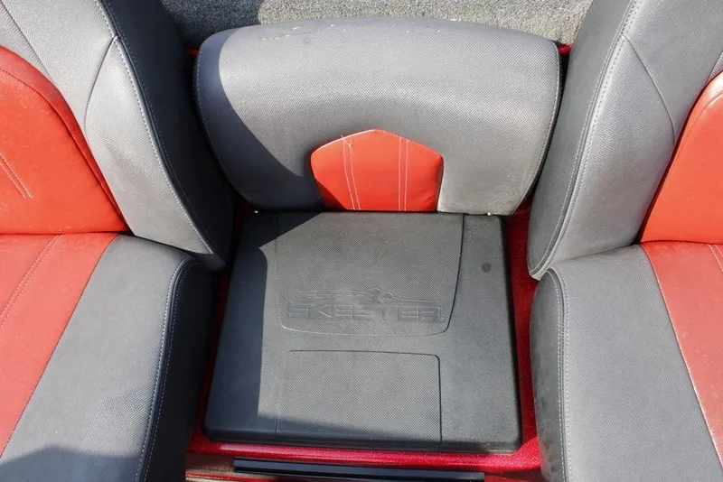 Slide: The Image of 2016 Skeeter FX20 boat seating with red and black upholstery. - 7