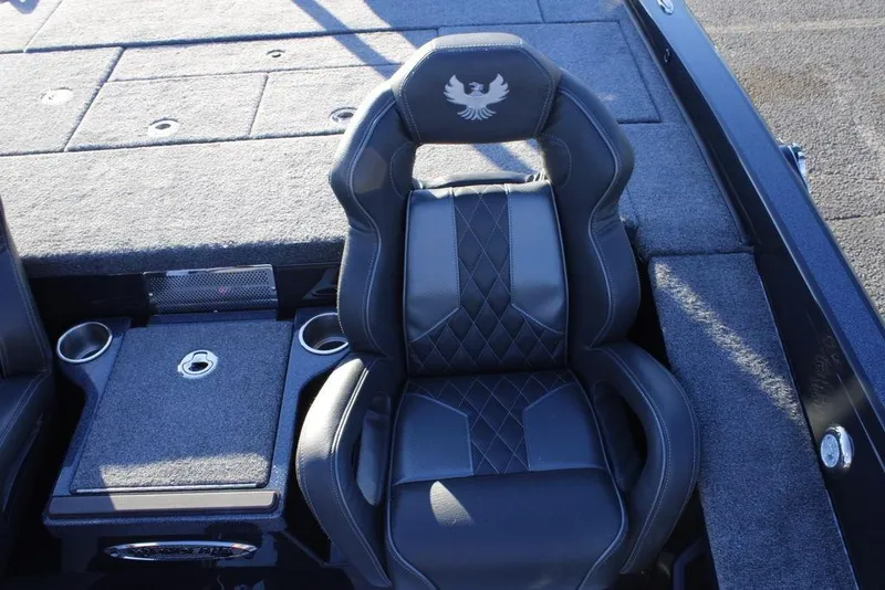 Slide: The Image of Luxurious seating in 2026 Phoenix 921 ELITE boat with cup holders and storage. - 11