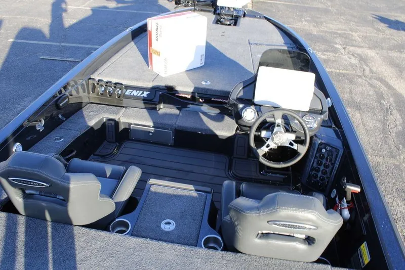 Slide: The Image of 2026 Phoenix 921 ELITE boat interior with dual seats and modern dashboard. - 9