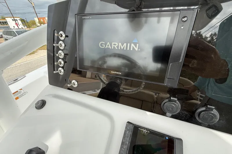 Slide: The Image of 2019 Sportsman Heritage 211 Center Console with Garmin GPS display. - 16