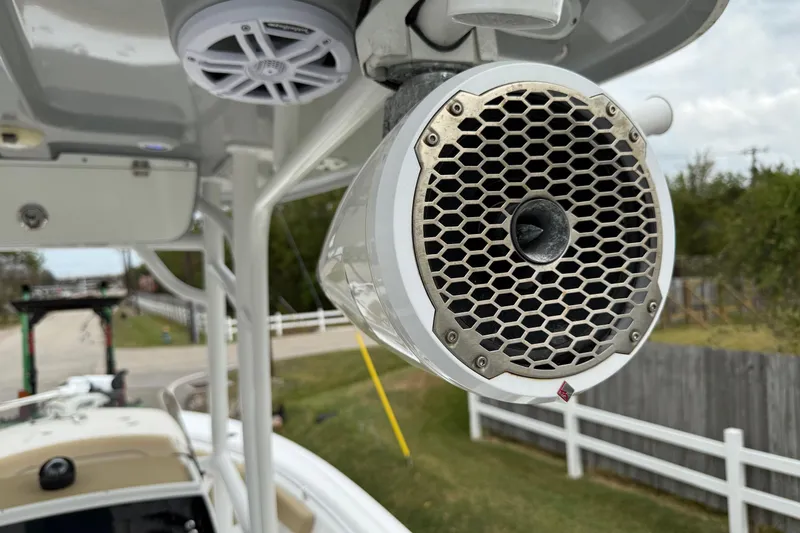 Slide: The Image of Close-up of a speaker on a 2019 Sportsman Heritage 211 Center Console boat. - 18