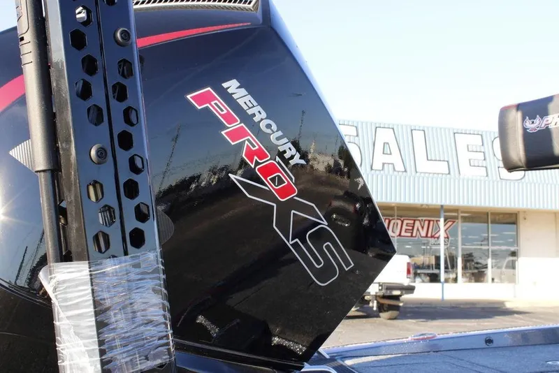 Slide: The Image of 2026 Phoenix 721 boat with Mercury Pro XS engine at dealership. - 14