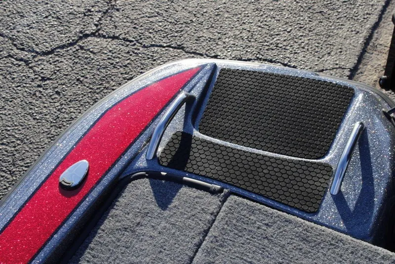 Slide: The Image of 2026 Phoenix 721 boat deck with red and black accents on textured surface. - 21