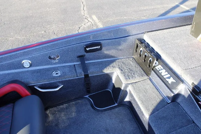 Slide: The Image of Interior of a 2026 Phoenix 721 boat, featuring seating and control panel. - 22