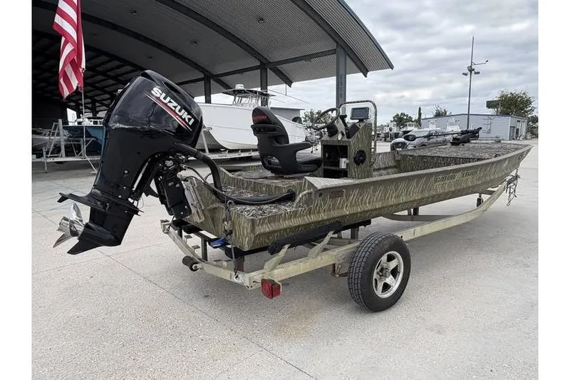 Slide: The Image of 2013 Gator Trax 17X54 boat with Suzuki outboard motor on trailer. - 5