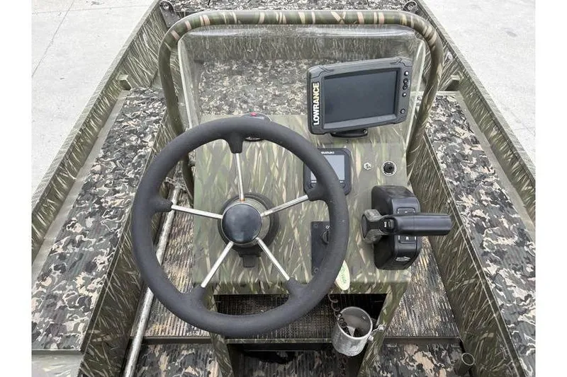 Slide: The Image of 2013 Gator Trax 17X54 boat console with steering wheel and Lowrance GPS. - 9