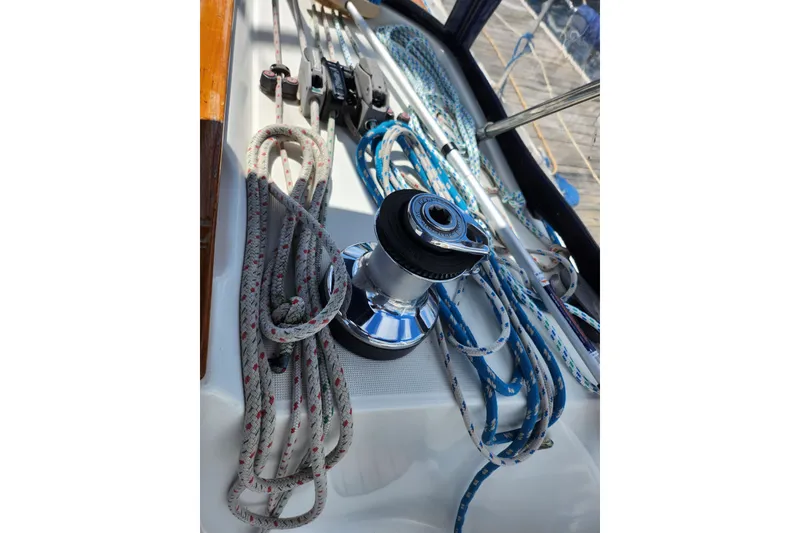 Slide: The Image of Deck of 2001 Jeanneau Sun Odyssey 34.2 with winch and ropes. - 13