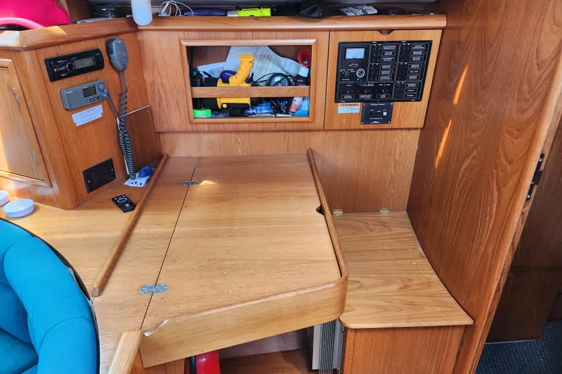 Slide: The Image of Interior of 2001 Jeanneau Sun Odyssey 34.2 sailboat with navigation equipment. - 19