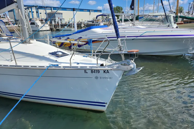 Slide: The Image of Jeanneau Sun Odyssey 34.2 sailboat docked in marina, 2001 model. - 3