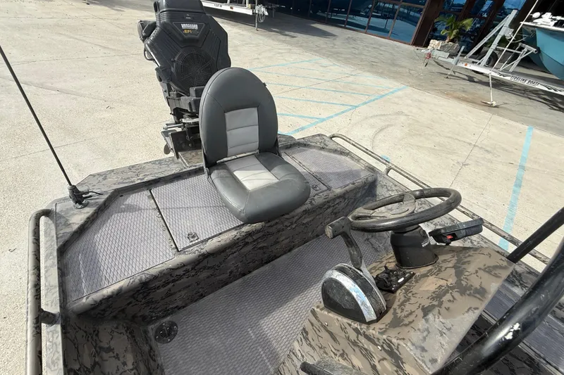 Slide: The Image of 2018 Gator Tail 1860cc Extreme boat interior with steering wheel and seat. - 10