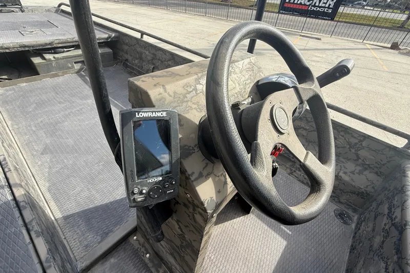 Slide: The Image of Steering console of 2018 Gator Tail 1860cc Extreme boat with Lowrance fish finder. - 12