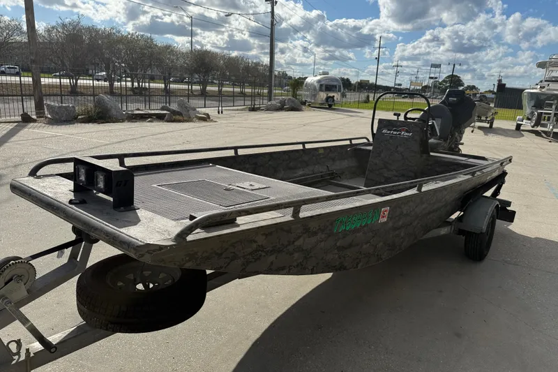 Slide: The Image of 2018 Gator Tail 1860cc Extreme boat on trailer under cloudy sky. - 3
