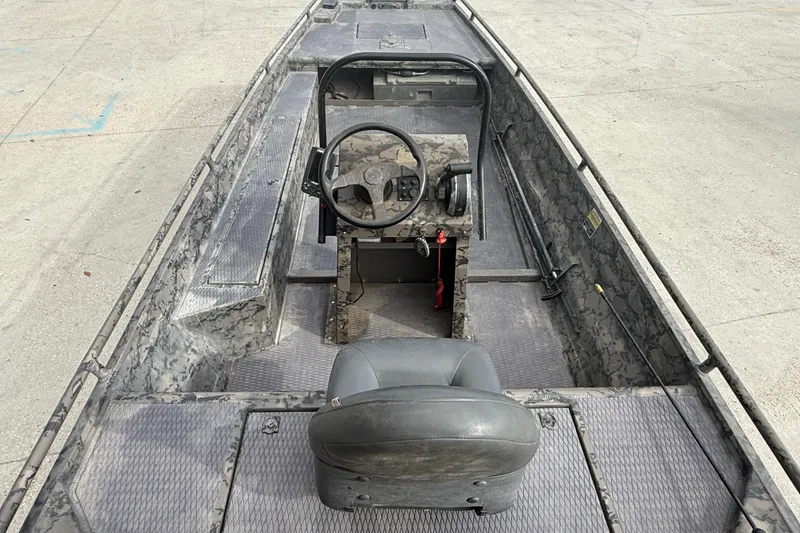 Slide: The Image of 2018 Gator Tail 1860cc Extreme boat interior with steering console and seating. - 7