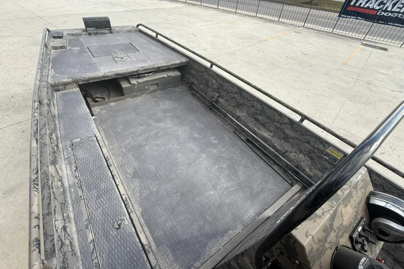 Slide: The Image of 2018 Gator Tail 1860cc Extreme boat interior with camo design and spacious deck. - 8