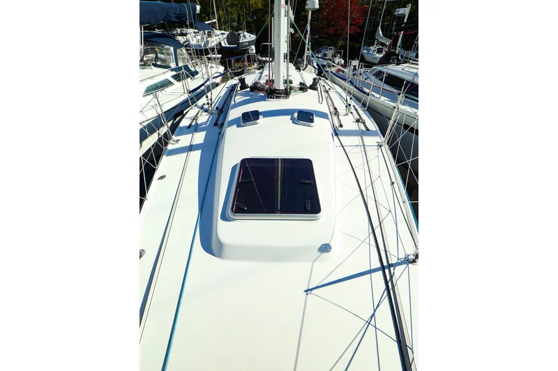 Slide: The Image of 2005 J Boats J/133 sailboat deck view with rigging and hatch. - 2