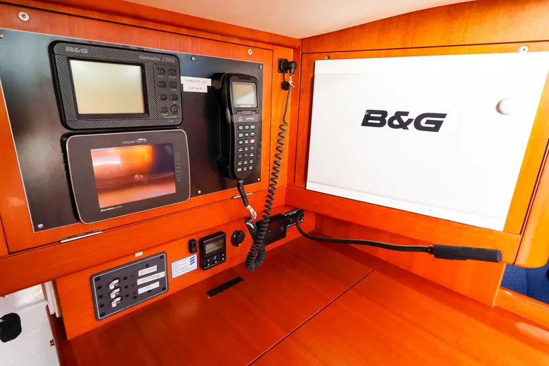 Slide: The Image of Navigation equipment on 2005 J Boats J/133 yacht, featuring B&G systems and communication devices. - 28
