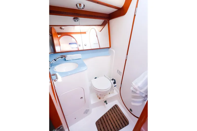 Slide: The Image of Compact bathroom in 2005 J Boats J/133 yacht with sink, toilet, and mirror. - 35