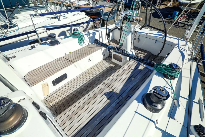 Slide: The Image of 2005 J Boats J/133 sailboat cockpit with teak decking and steering wheel. - 6