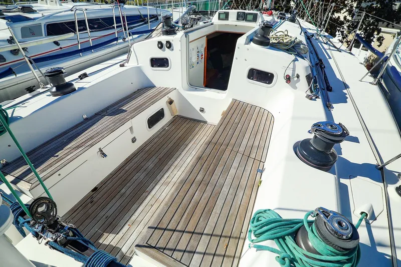 Slide: The Image of 2005 J Boats J/133 sailboat cockpit with teak flooring and winches. - 9